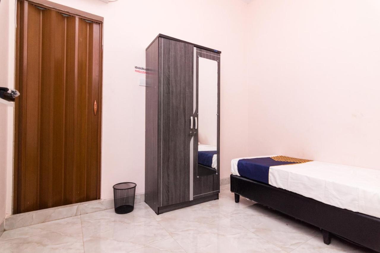 Oyo 1917 Mamora Homestay Batam Bagian luar foto